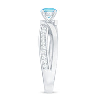 Natural 0.8 carat aquamarine and diamond infinity engagement ring by Rosec Jewels featuring a delicate band and sparkling gemstones.