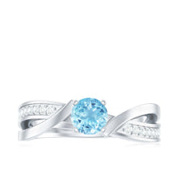 Natural 0.8 carat aquamarine and diamond infinity engagement ring by Rosec Jewels, featuring a detailed close-up of the ring's design.