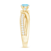 Natural 0.8 carat aquamarine and diamond infinity engagement ring by Rosec Jewels, featuring a delicate band with sparkling stones.