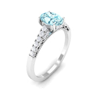 Oval 1 Carat genuine aquamarine engagement ring with diamond side stones from Rosec Jewels, showcasing elegant jewelry design.