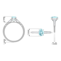 Oval 1 carat genuine aquamarine engagement ring with diamond side stones from Rosec Jewels, showcasing the elegant design and sparkling details.