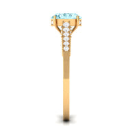 Oval 1 carat genuine aquamarine engagement ring with diamond side stones from Rosec Jewels, showcasing the elegant gemstone and sparkling accents.