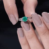 Round Emerald Solitaire Engagement Ring in Bypass Shank