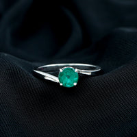Round Emerald Solitaire Engagement Ring in Bypass Shank