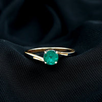 Round Emerald Solitaire Engagement Ring in Bypass Shank