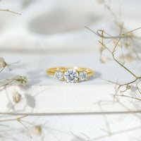 Certified Moissanite three-stone engagement ring for her, featuring sparkling stones and a polished silver band by Rosec Jewels.