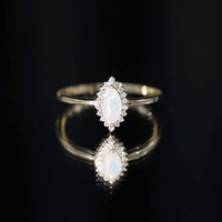0.5 Carat Ethiopian Opal Marquise Cut Engagement Ring with Diamond Halo