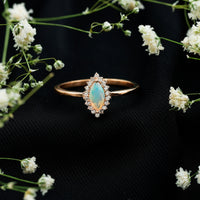 0.5 Carat Ethiopian Opal Marquise Cut Engagement Ring with Diamond Halo