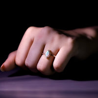 0.5 Carat Ethiopian Opal Marquise Cut Engagement Ring with Diamond Halo