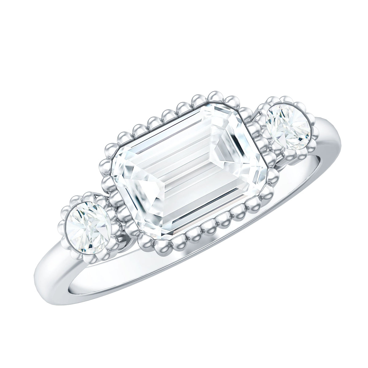 Emerald cut moissanite three-stone engagement ring with east-west setting by Rosec Jewels, featuring sparkling center stones and elegant band.