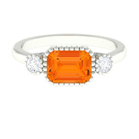East West Fire Opal engagement ring with diamond accents from Rosec Jewels, showcasing a vibrant fire opal centerpiece and sparkling diamonds.