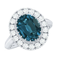 Rosec Jewels London Blue Topaz engagement ring with a large blue topaz gemstone and diamond accents in a statement design.