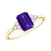 Emerald cut 1.4 carat amethyst engagement ring with diamond trio setting by Rosec Jewels, showcasing a sparkling purple gemstone and side diamonds.