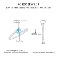 Rosec Jewels aquamarine and diamond promise ring with bypass shank, showcasing sparkling gemstones and elegant silver band.
