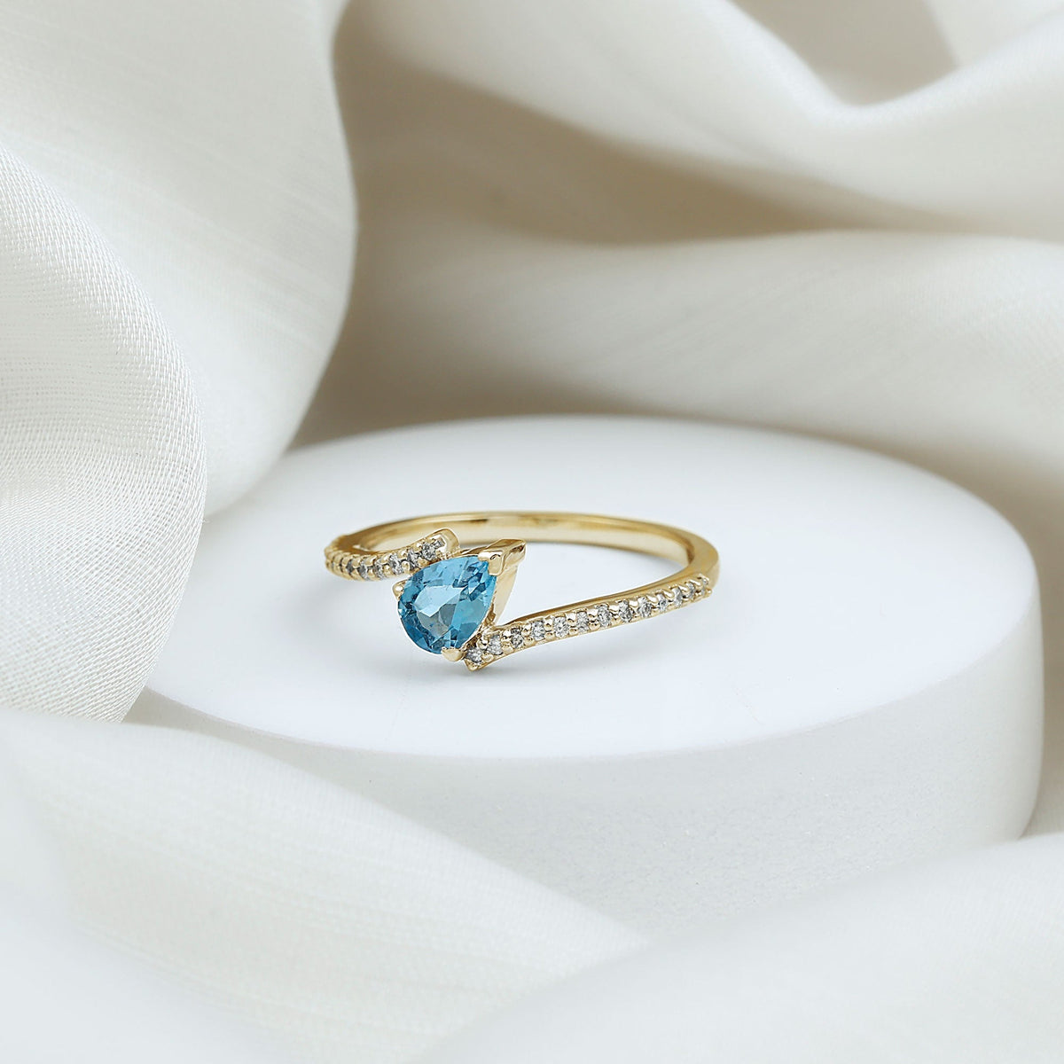 Rosec Jewels real aquamarine and diamond promise ring with bypass shank, showcasing sparkling gemstones and elegant design.