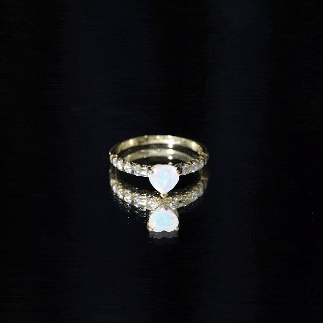 Heart-shaped 0.75 carat Ethiopian opal and diamond engagement ring with yellow gold band from Rosec Jewels.