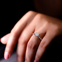 Heart-shaped Ethiopian opal and diamond engagement ring featuring a 0.75 carat center stone, crafted by Rosec Jewels.