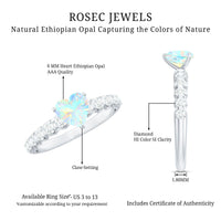 Heart-shaped Ethiopian opal and diamond engagement ring with 0.75 carats, set in a elegant ring design by Rosec Jewels.