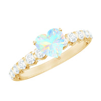 Heart-shaped Ethiopian opal and diamond engagement ring featuring a 0.75 carat center stone, crafted by Rosec Jewels.