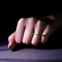 Heart-shaped Ethiopian opal and diamond engagement ring with rose gold band from Rosec Jewels, showcasing intricate design and sparkling stones.