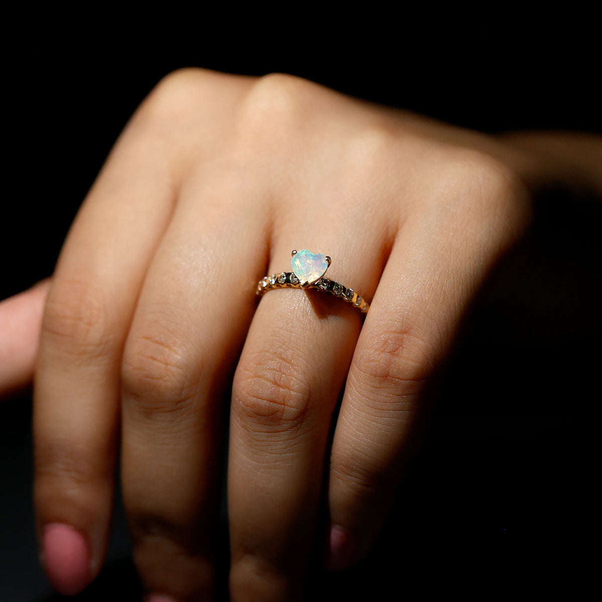 Heart-shaped Ethiopian opal and diamond engagement ring featuring a 0.75 carat center stone in a Rosec Jewels ring.