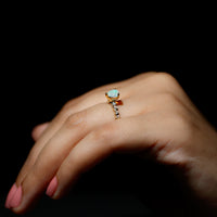 Heart-shaped Ethiopian opal and diamond engagement ring with a 0.75 carat center stone, set in a elegant ring design by Rosec Jewels.