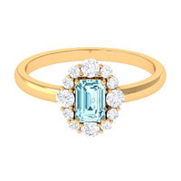 Octagon aquamarine engagement ring with diamond halo from Rosec Jewels, showcasing a sparkling aquamarine center stone and diamond accents.