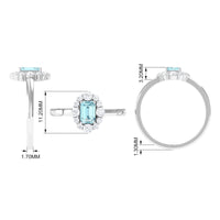 Octagon aquamarine engagement ring with diamond halo from Rosec Jewels, featuring a central aquamarine gemstone and surrounding diamonds.