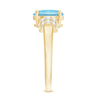 Oval cut aquamarine engagement ring with diamond collar from Rosec Jewels, showcasing the elegant gemstone and sparkling accents.