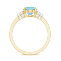 Oval cut aquamarine engagement ring with diamond collar from Rosec Jewels, featuring a 1 carat center stone and intricate band details.