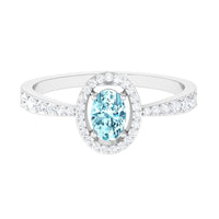 1 CT aquamarine engagement ring with diamond halo from Rosec Jewels, featuring a sparkling aquamarine center stone and intricate band.