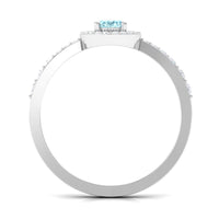 1 ct aquamarine engagement ring with diamond halo featuring a silver band and intricate detailing by Rosec Jewels.