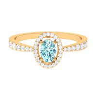 1 CT aquamarine engagement ring with diamond halo from Rosec Jewels, featuring a sparkling aquamarine gemstone and detailed band.
