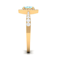 1 carat aquamarine engagement ring with diamond halo from Rosec Jewels, showcasing the elegant gemstone and sparkling halo setting.