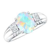 Ethiopian opal engagement ring with 1.3 carats, oblong shape, accented by diamonds, by Rosec Jewels.
