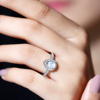 Sterling silver Zircon teardrop halo engagement ring with intricate detailing, designed by Rosec Jewels.