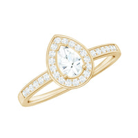 Rosec Jewels zircon teardrop halo engagement ring with sparkling center stone and intricate band design.