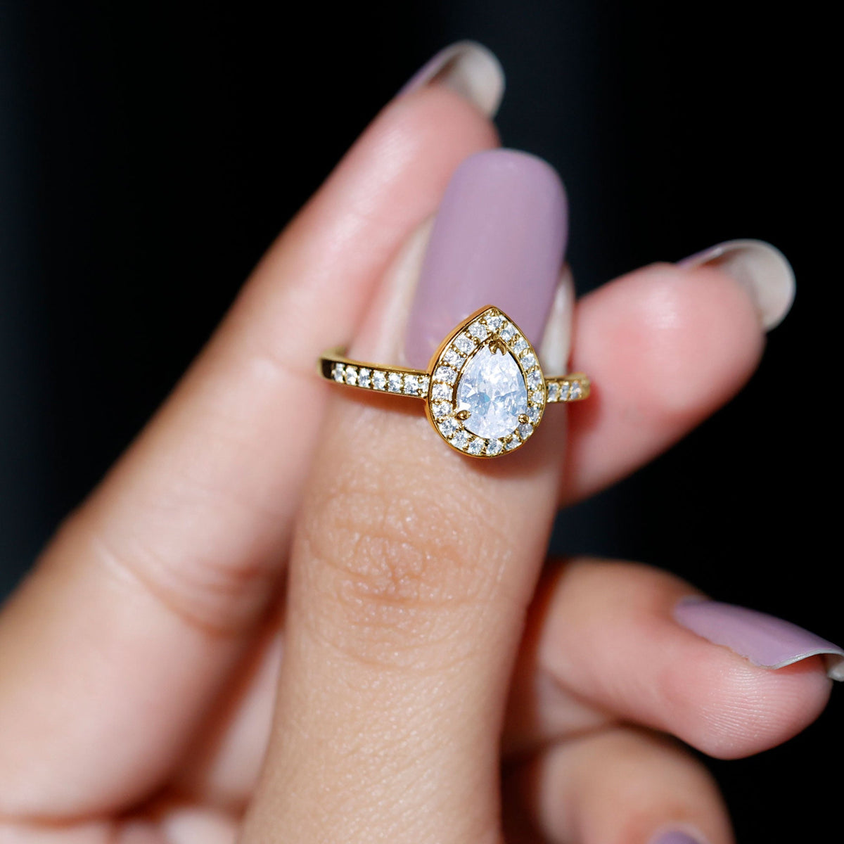 Zircon teardrop halo engagement ring by Rosec Jewels featuring a sparkling teardrop-shaped zircon center stone and halo setting.