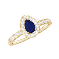 Genuine 0.5 carat blue sapphire and diamond pear halo engagement ring from Rosec Jewels, featuring a detailed ring design.