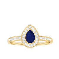 Genuine 0.5 carat blue sapphire and diamond pear halo engagement ring by Rosec Jewels, featuring a platinum band and intricate design.