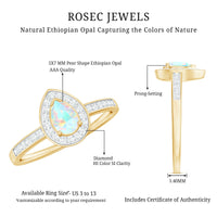 Natural 5x7mm opalescent teardrop engagement ring with diamond halo, featuring a delicate and elegant design by Rosec Jewels.