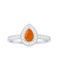 Classic fire opal engagement ring with diamond halo from Rosec Jewels, featuring a vibrant fire opal centerpiece and sparkling diamond accents.