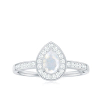 Elegant 1.25 CT moonstone and diamond halo engagement ring by Rosec Jewels featuring a classic design and sparkling center stone.