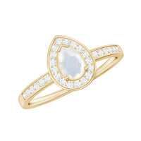 1.25 CT Moonstone and diamond halo engagement ring from Rosec Jewels featuring a central moonstone with a diamond halo setting.