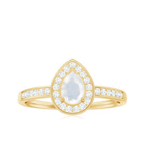 Rosec Jewels 1.25 CT moonstone and diamond halo engagement ring showcasing a central moonstone surrounded by a diamond halo.