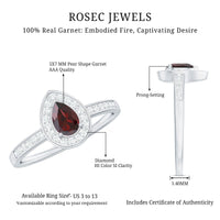 Pear-shaped garnet engagement ring with diamond halo from Rosec Jewels, showcasing the elegant gemstone and sparkling halo setting.