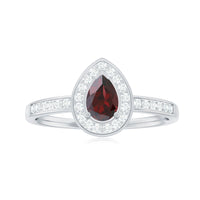 Pear-shaped garnet engagement ring with diamond halo from Rosec Jewels, featuring a classic and elegant design.