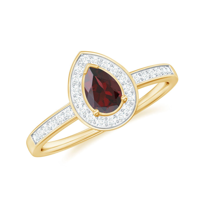 Pear-shaped garnet engagement ring with diamond halo from Rosec Jewels, showcasing a sparkling gemstone and intricate band design.