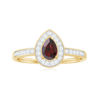 Pear-shaped garnet engagement ring with diamond halo from Rosec Jewels, showcasing sparkling gemstones and elegant design.