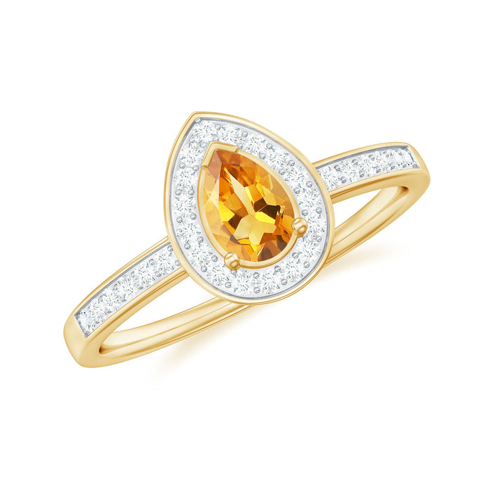 Natural 5x7mm pear-shaped citrine engagement ring with diamond halo by Rosec Jewels, showcasing the elegant gemstone and detailed band.